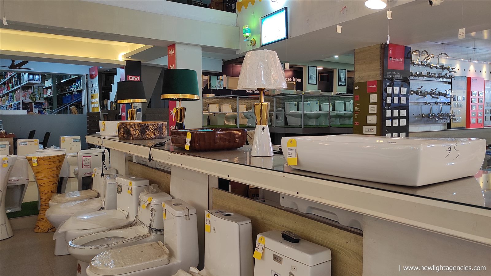 Wash basins, toilets and bathroom sanitaryware displayed in the Newlight showroom
